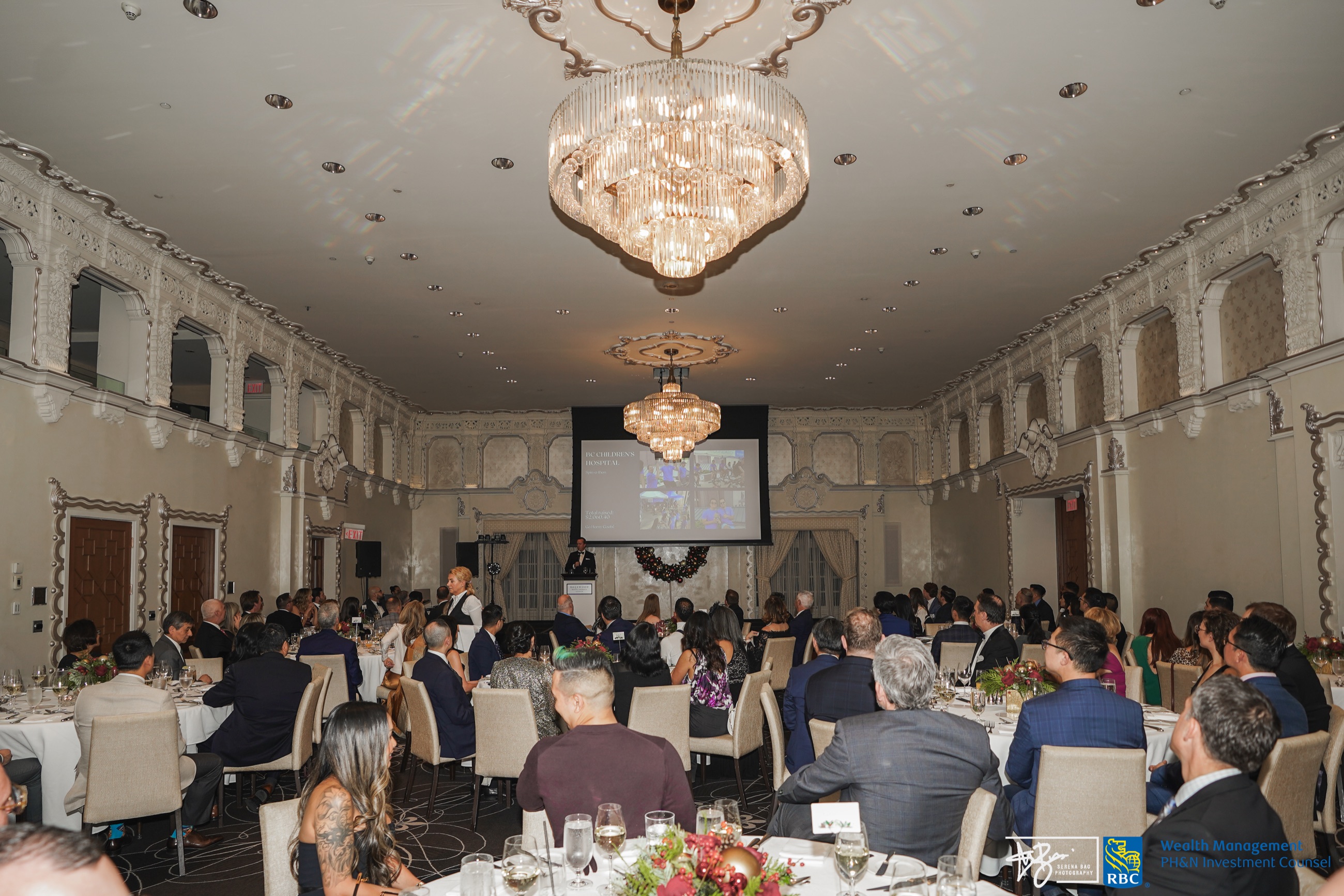 Guests seated for the RBC PH&N Christmas dinner in an elegant ballroom